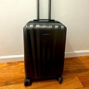 Like-New Ricardo Carry-On Suitcase